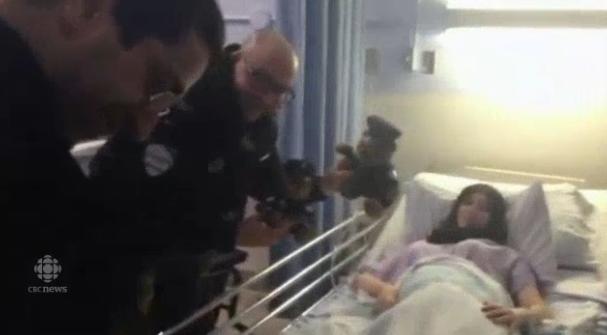 Const. Jean-Pierre Brabant visits new baby with police teddy bear CBC